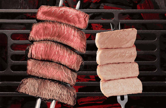 Background image of grill with large grilling forks with beef cooked at different doneness, a second fork to the right with Pork cooked at different doneness.