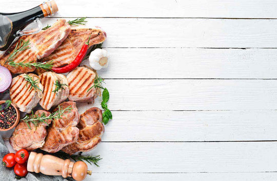 ZFF Premium Pork, grilled with herbs and spices on white washed wood background 
