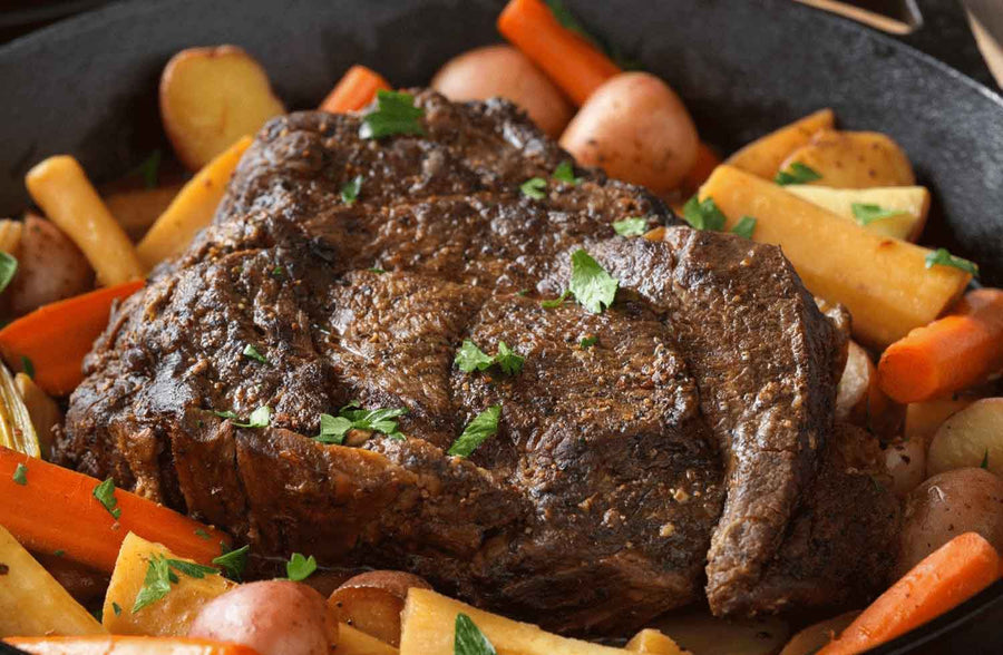 Beef Arm Roast with vegetables, moist and tender.